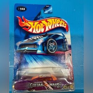 Custom ‘59 Cadillac Purple and Orange Guitar Wars Car